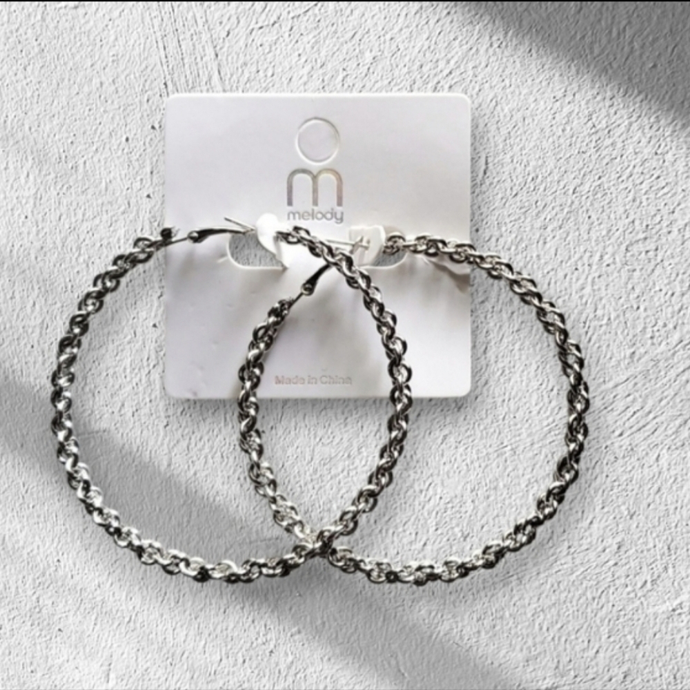 Twisted Hoop Earrings By Melody